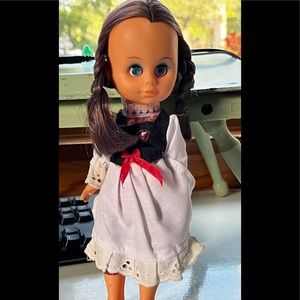 Vintage sleep eyes doll with braids. 10” tall in bohemian dress.